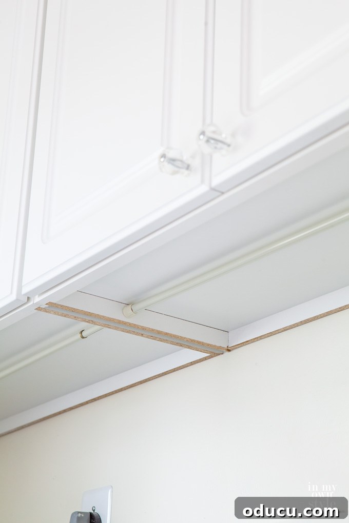 Our Mudroom Transformation with True Value 5 Detailed instructions on how to use and hang a tension rod securely