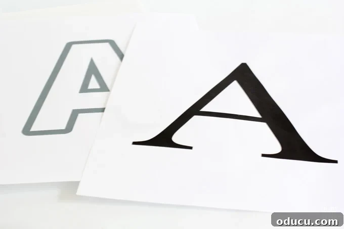 Create Custom Button Letter Wall Art 4 Two letter A printed out using different fonts showing which is better when making button letter art. One has sufficient white space, the other does not.