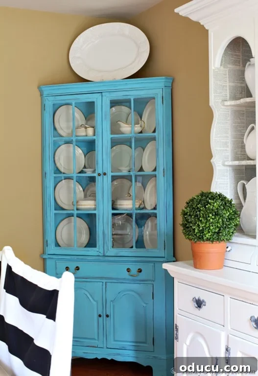 Love-this-furniture-before-and-after-using-DIY-Chalk-Paint.jpg - Corner hutch painted with DIY chalk paint