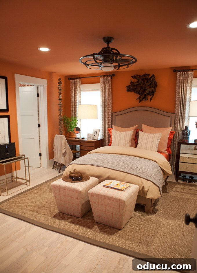 Step Inside the HGTV Dream Home 2016 15 A beautifully decorated orange bedroom at the HGTV Dream Home, showcasing vibrant colors and comfortable furnishings.