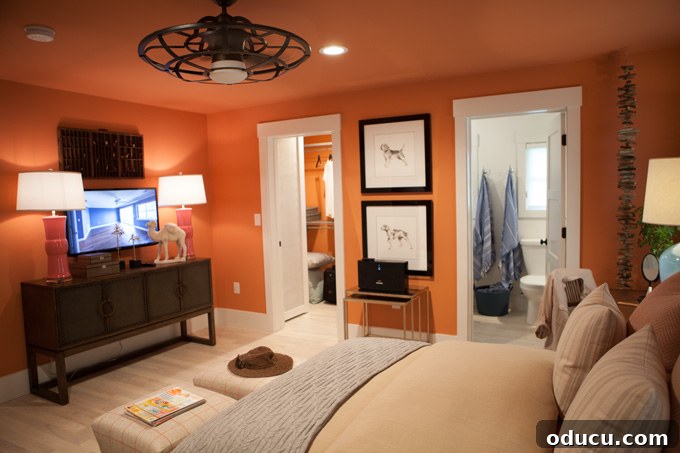 Step Inside the HGTV Dream Home 2016 16 A closer view of the inviting orange bedroom, featuring a blend of textures and decorative accents.