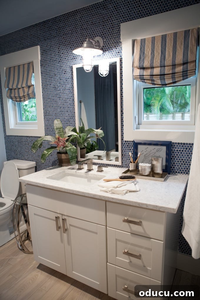 Step Inside the HGTV Dream Home 2016 21 The full bathroom connected to one of the serene bedrooms, featuring custom string art of a marlin and beautiful tiling.