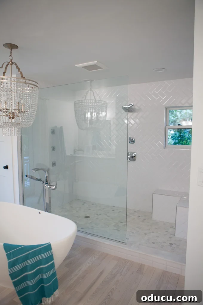 Step Inside the HGTV Dream Home 2016 29 A closer look at the master bathroom in the HGTV Dream Home 2016, highlighting the expansive glass-enclosed shower.