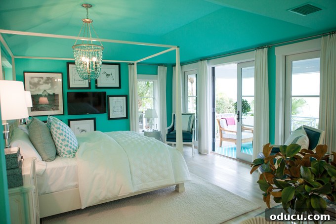 Step Inside the HGTV Dream Home 2016 30 The tranquil Teal Bedroom in the HGTV Dream Home 2016, with access to a porch overlooking the pool and water.