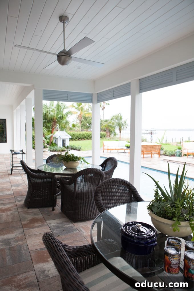Step Inside the HGTV Dream Home 2016 35 The expansive back porch and sparkling pool area of the HGTV Dream Home 2016, perfect for relaxation and entertaining.