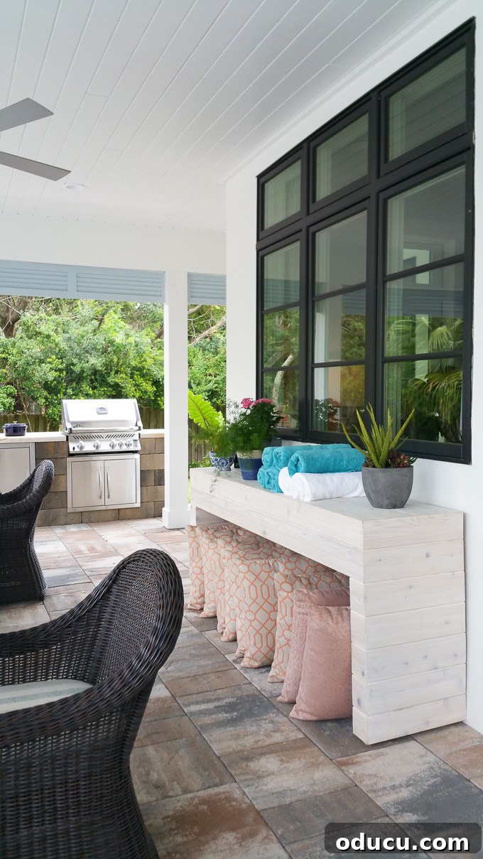 Step Inside the HGTV Dream Home 2016 37 An inviting outdoor space at the HGTV Dream Home 2016, featuring stylish seating and lush greenery.
