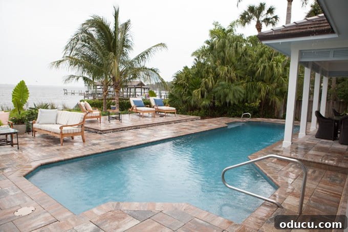 Step Inside the HGTV Dream Home 2016 39 The stunning pool of the HGTV Dream Home 2016, reflecting the clear blue sky and surrounded by beautiful landscaping.