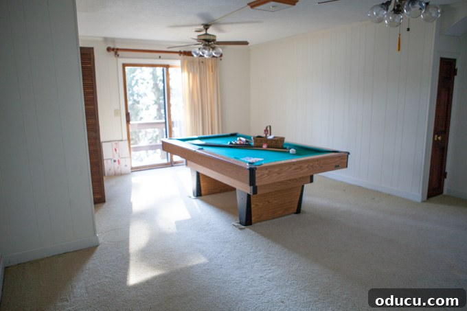 A Glimpse Inside My Brand New Home 26 Bedroom #3 transformed into a game and fitness room with a pool table.