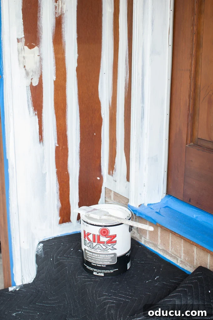 Transform Your Wood Paneling with Paint 4 The best water based stain blocking primer to use to paint wood paneling from the 1970's. A DIY guide to modernizing dated wood.