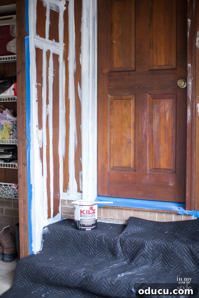 Transform Your Wood Paneling with Paint 5 Before and after DIY garage makeover showing how to paint wood paneling to transform a space.
