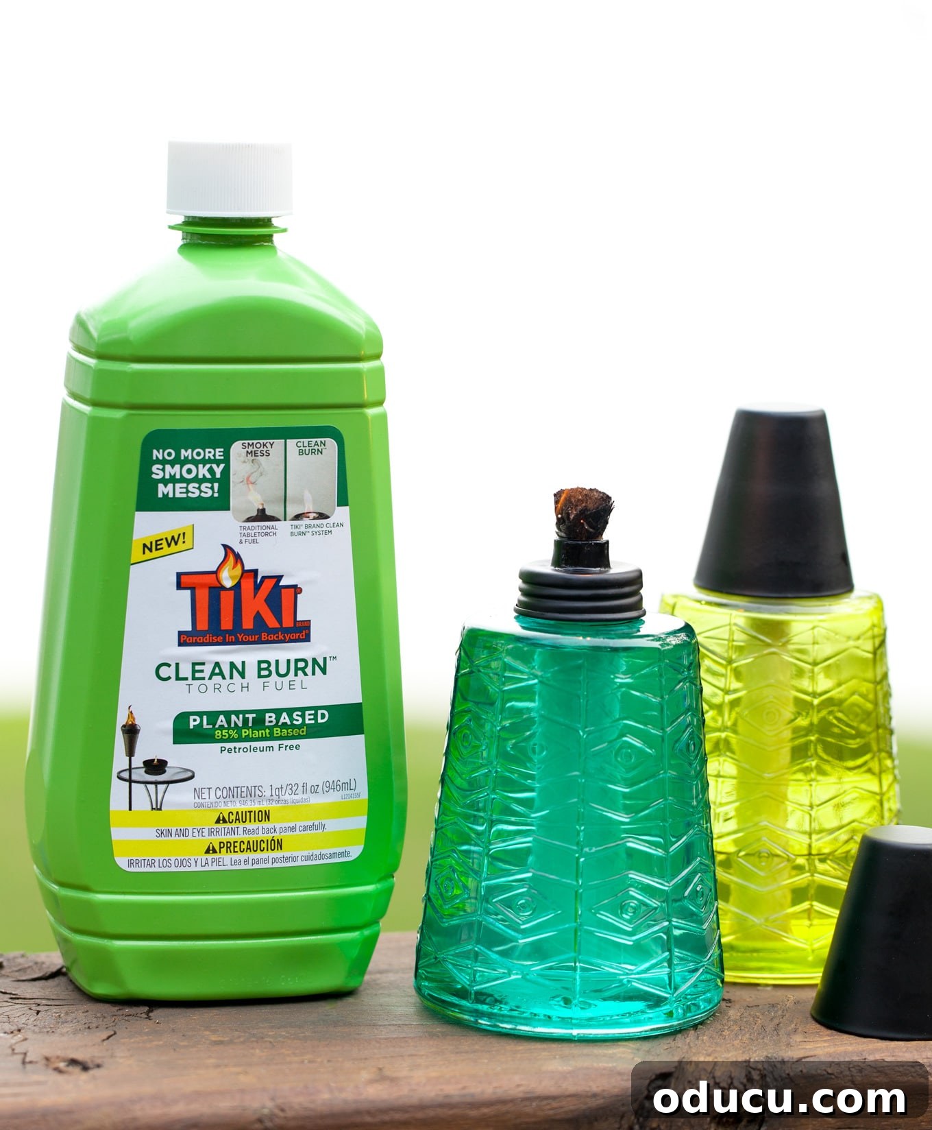 Seamless Outdoor Soirees 5 TIKI-Clean-Burn-Torch-Fuel, a revolutionary plant-based fuel for cleaner outdoor ambiance.