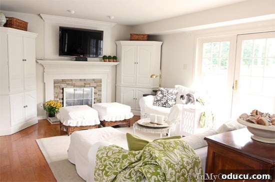 Sew Your Own Pleated Ottoman Slipcover 3 White decorated living room with hardwood floors.