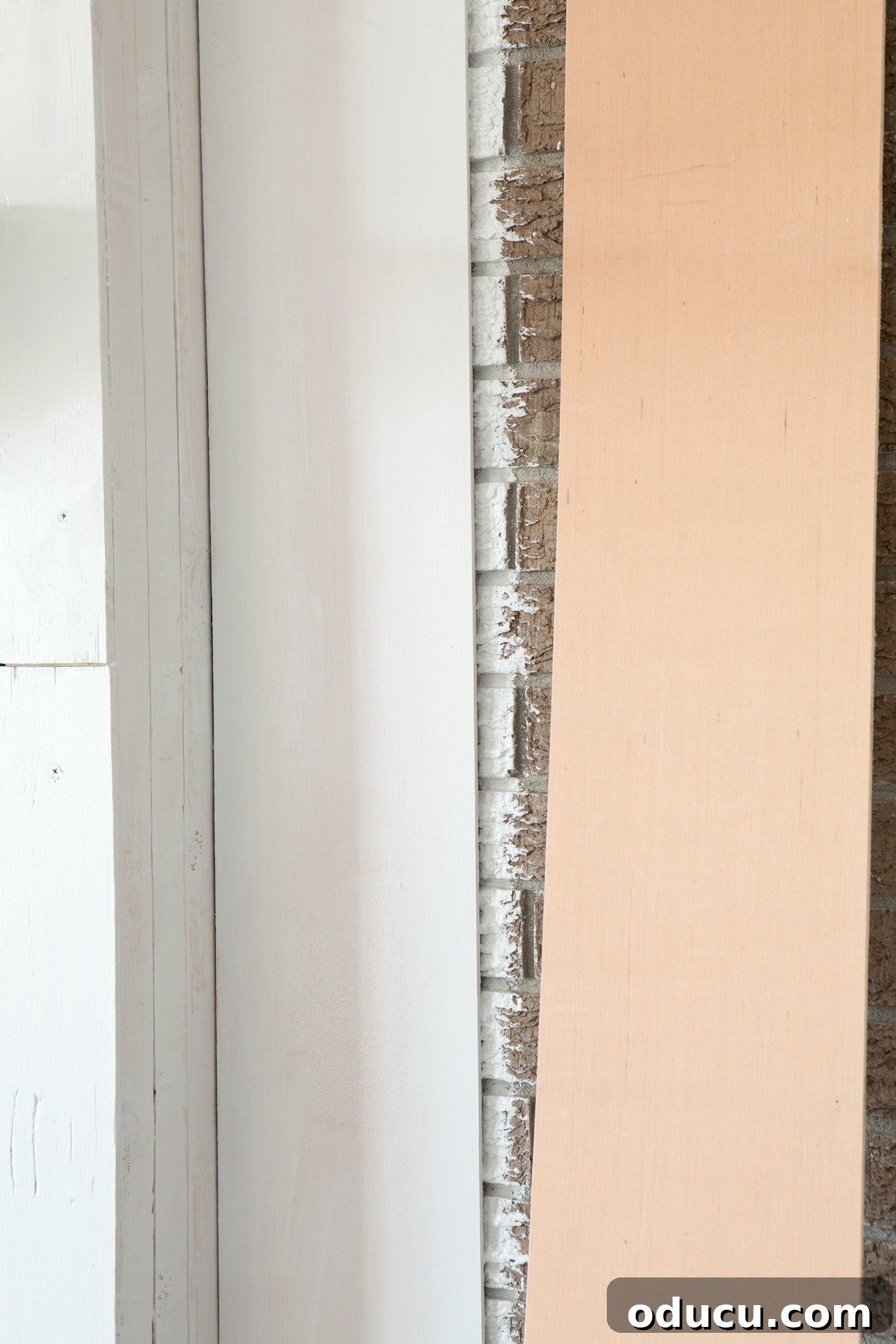 Elevated Vertical Plank Walls 8 Subflooring used for shiplap installation process, showing initial painting attempt