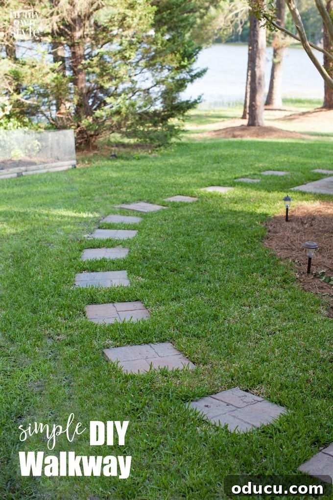 Charming Paver Paths Made Easy 11 Easy DIY paver stone walkway that is level with the grass for simple maintenance