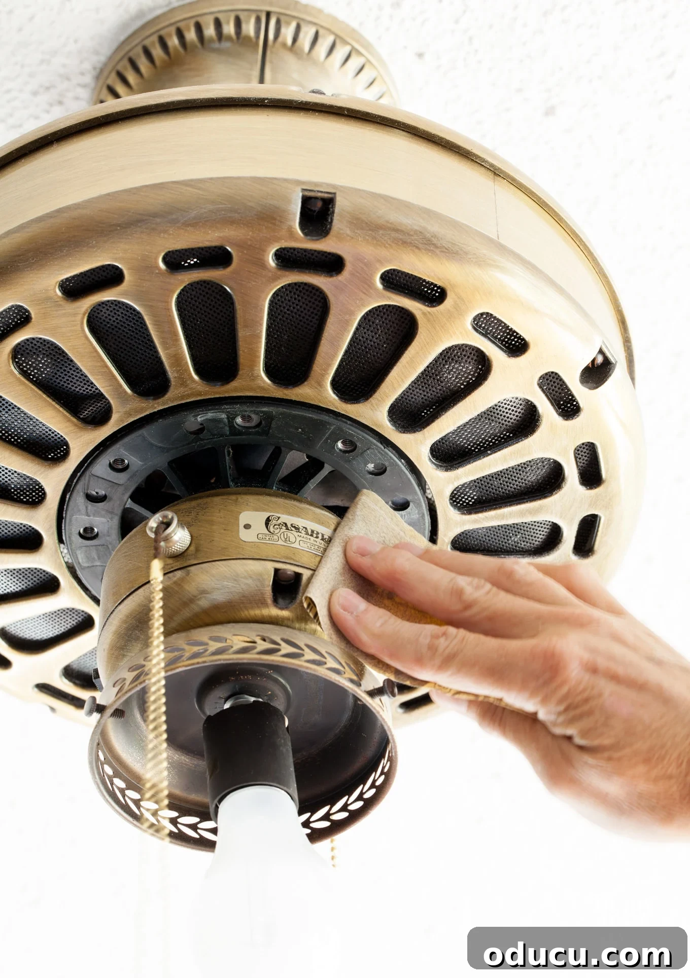 Paint Your Ceiling Fan In-Place 9 Sanding and cleaning ceiling fan parts before painting for optimal adhesion