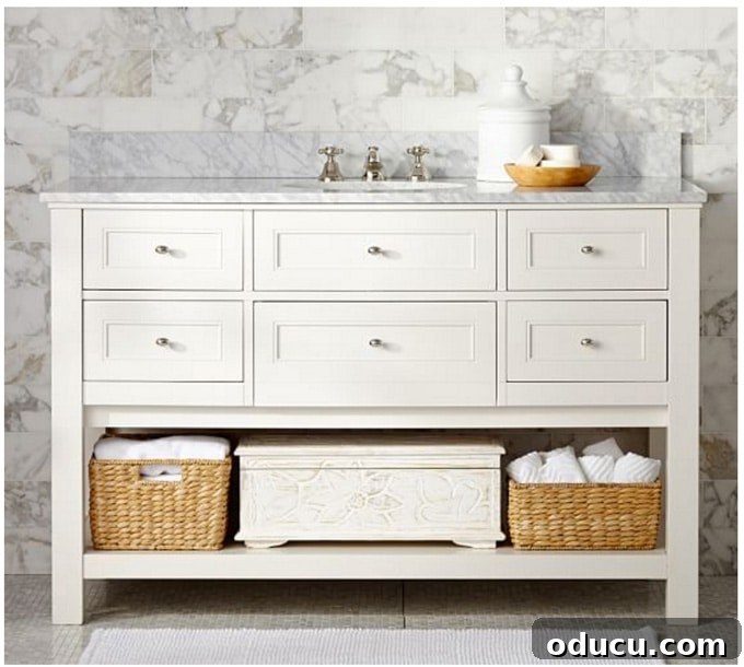 Transforming a Sideboard into a Bathroom Vanity 2 Repurposed sideboard transformed into a chic powder room sink vanity