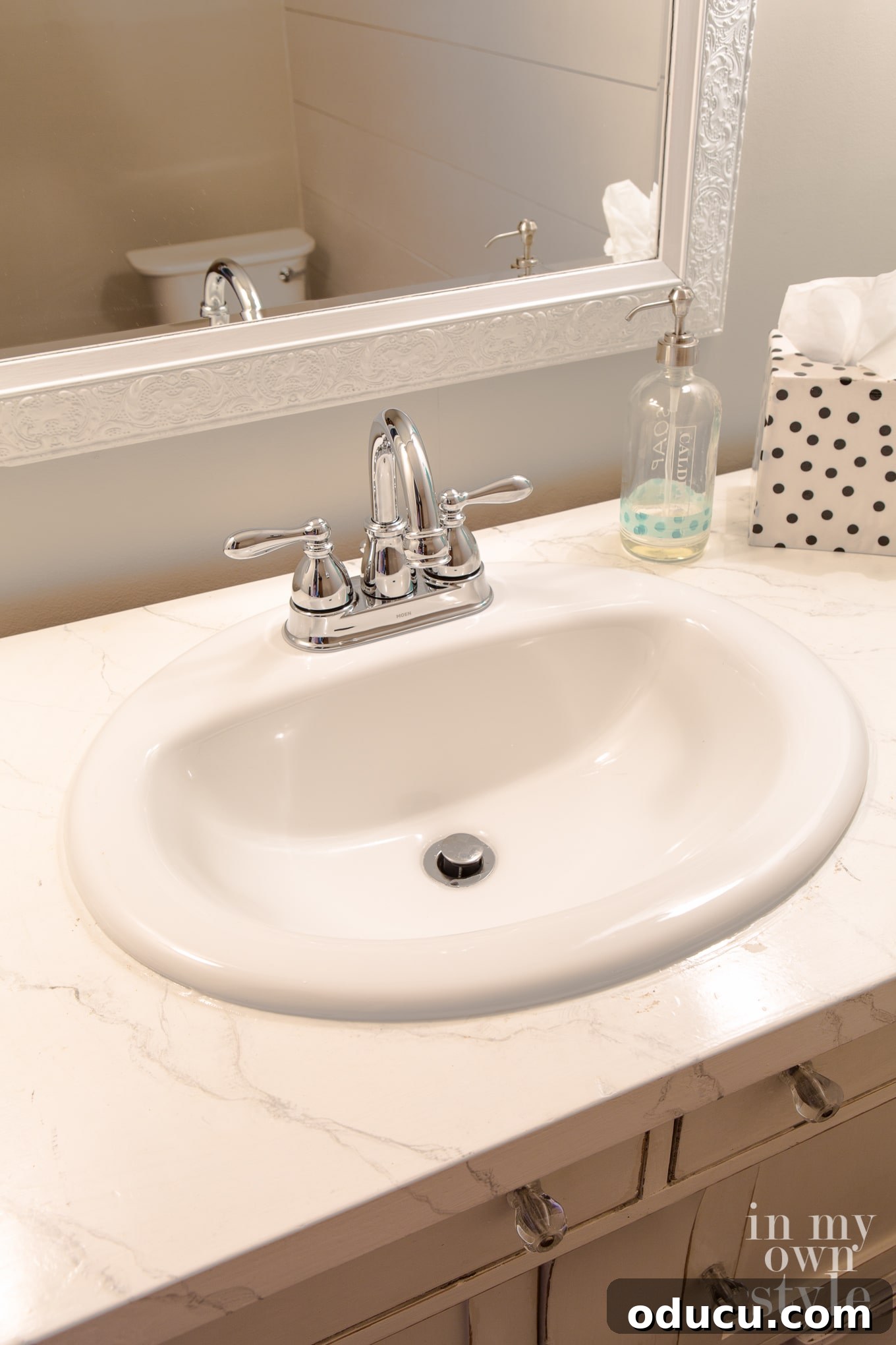 Transforming a Sideboard into a Bathroom Vanity 12 Newly installed drop-in sink and faucet in the repurposed vanity