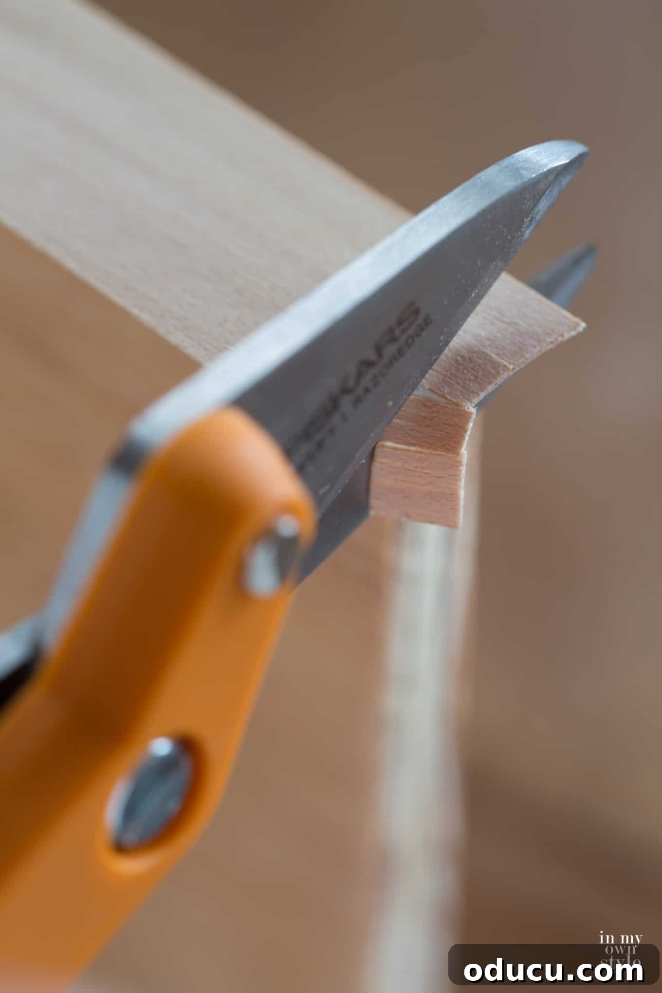 Transforming a Sideboard into a Bathroom Vanity 21 Using an iron to apply adhesive-backed wood veneer to plywood