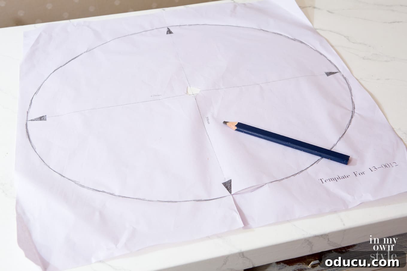 Transforming a Sideboard into a Bathroom Vanity 5 Paper sink template positioned for tracing onto the vanity top
