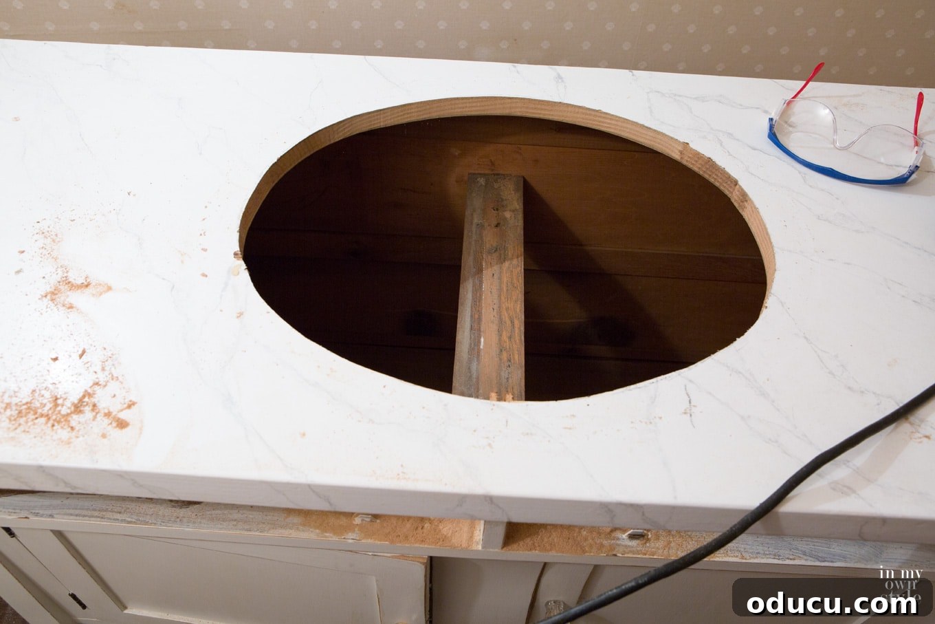Transforming a Sideboard into a Bathroom Vanity 9 Vanity top with sink opening cut, drawers removed for plumbing