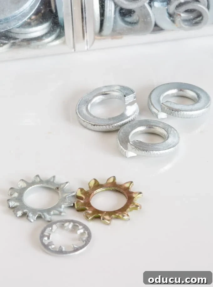 Stop the Wobble: How to Secure Inexpensive Cabinet Knobs 9 Split and tooth washers needed when tightening cabinet knobs
