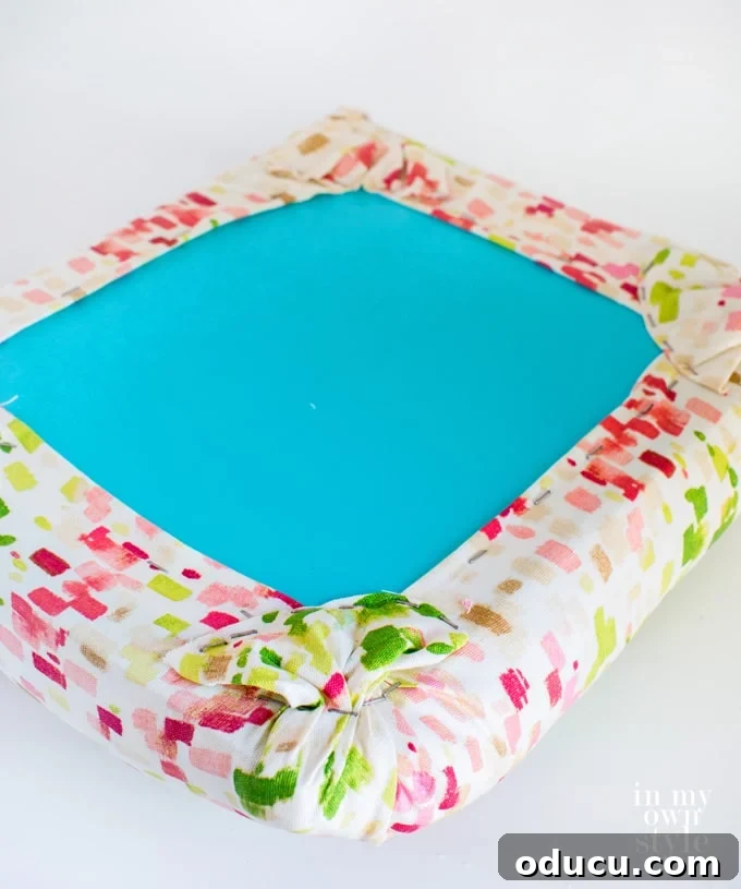 milk crate seat tutorial showing the neat underside of the cushion