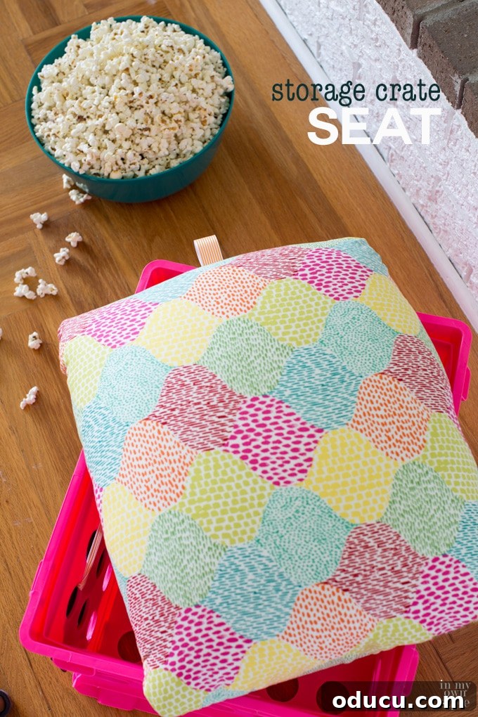 Double duty storage crate seat for dorm rooms, teacher's classrooms, and kid's rooms, showing ribbon pull in action.