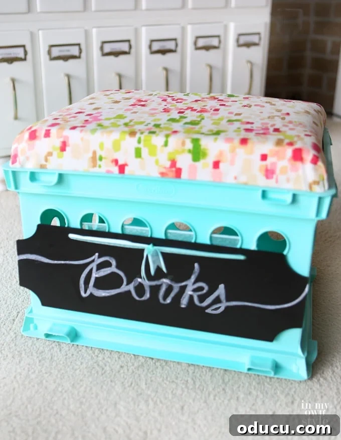Cheap college storage for dorm rooms using plastic storage crates with a turquoise foam cushion
