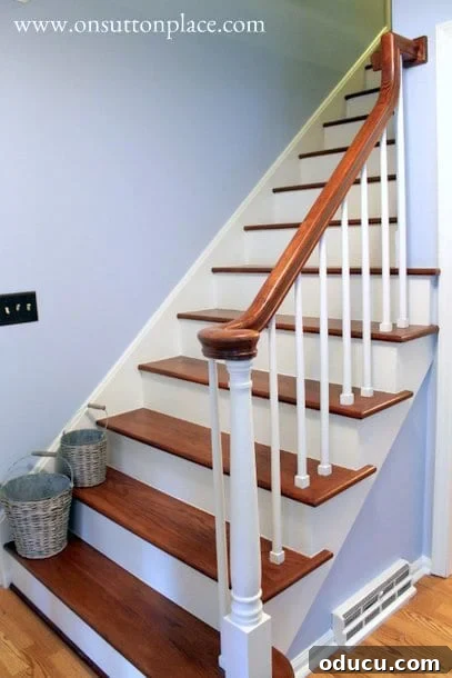 DIY Stair Riser Transformation 12 white painted newel post