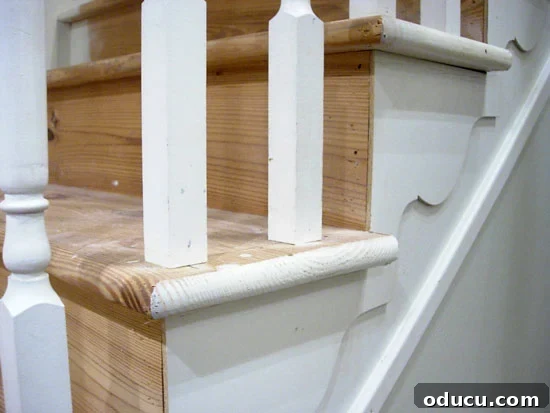 Stair-Makover---bullnose-si Detail of a bullnose stair tread showing paint overspray removal during sanding