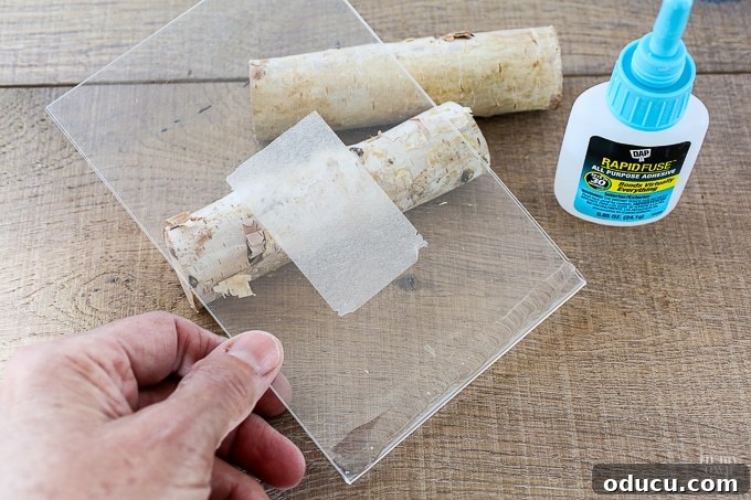 DIT easy to make fall photo frame showing logs being cut