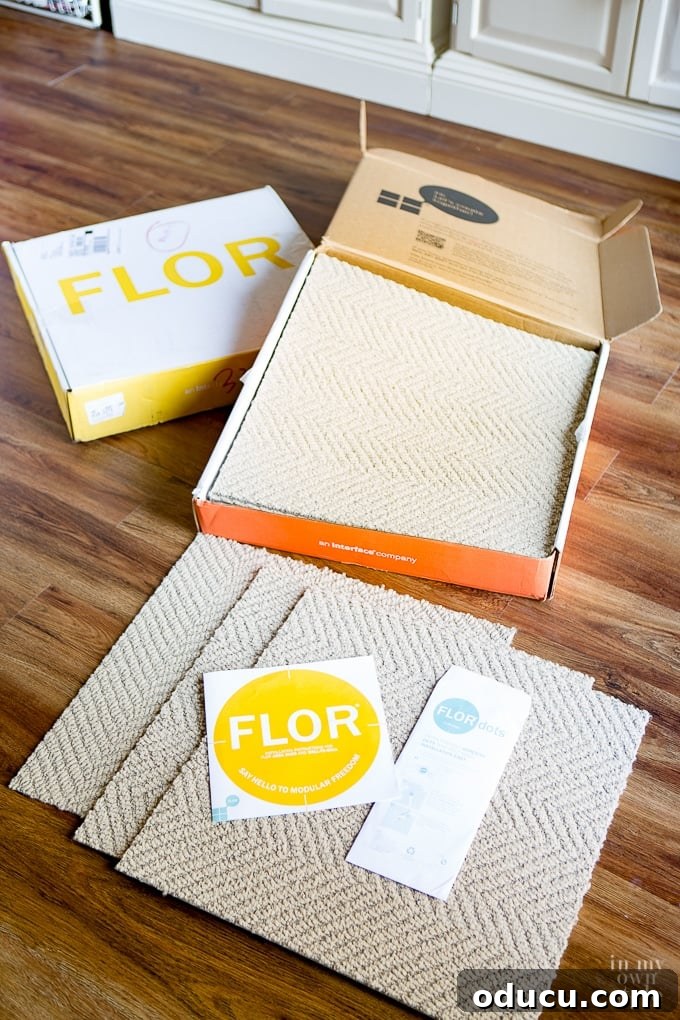 FLORing My Studioffice 4 FLOR rug tiles delivered, showcasing the 'Suit Yourself' design in Flax color