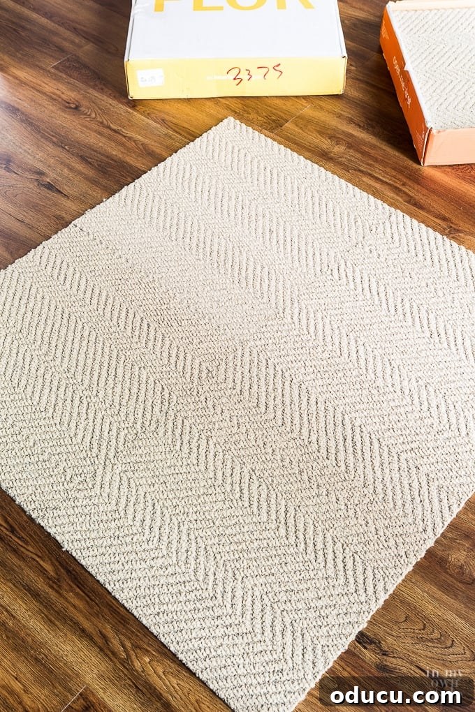FLORing My Studioffice 5 FLOR rug tiles in the design Suit Yourself and the color is flax, highlighting the texture