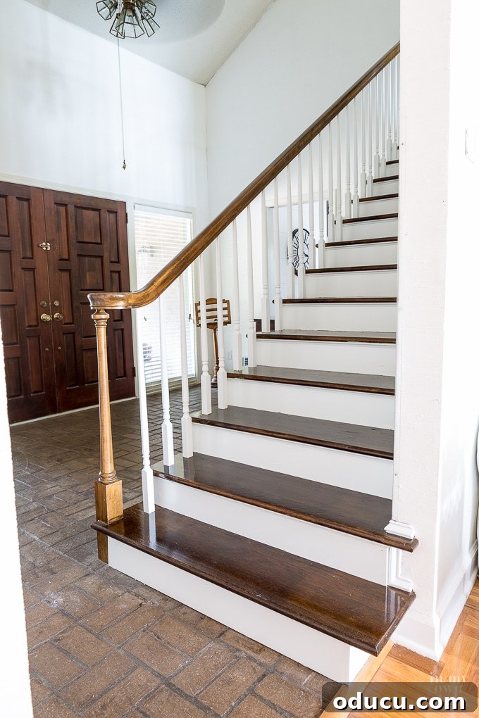 Revamp Your Stairs: Flawless Spindle Painting Made Simple 15 staircase-makeover-at the lake house
