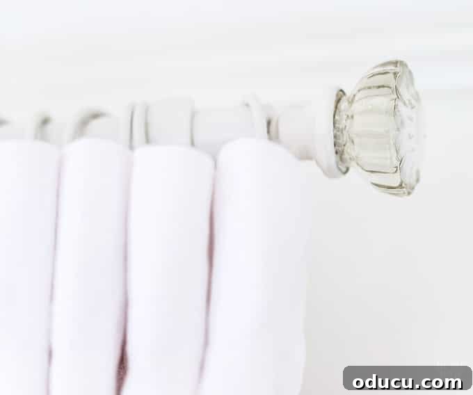 Design and Sew Expansive Drapes for Sliding Glass Doors 15 How to make curtain rod finials using glass door knobs