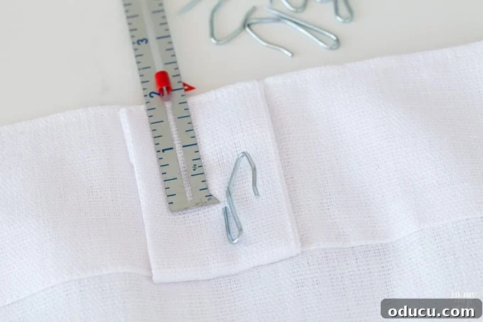 Design and Sew Expansive Drapes for Sliding Glass Doors 6 how to place drapery hooks on a drapes