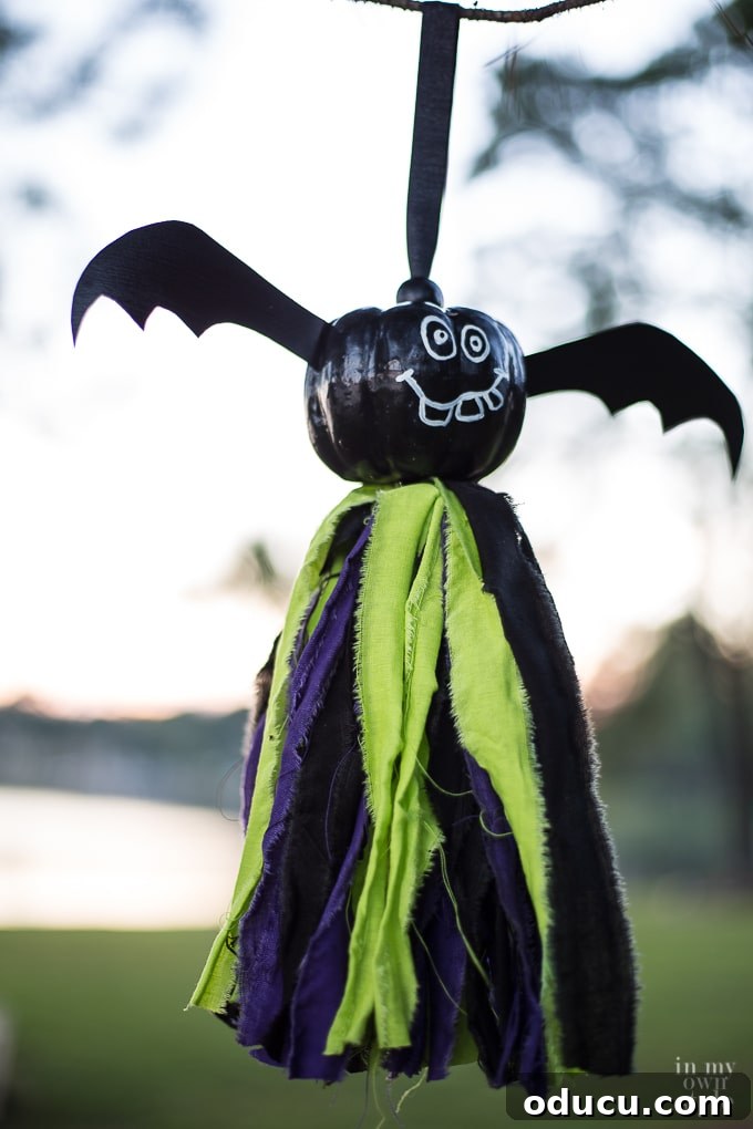 Wicked Whimsy: Pumpkin Bat Tassel Decor 19 Halloween decorating ideas to make