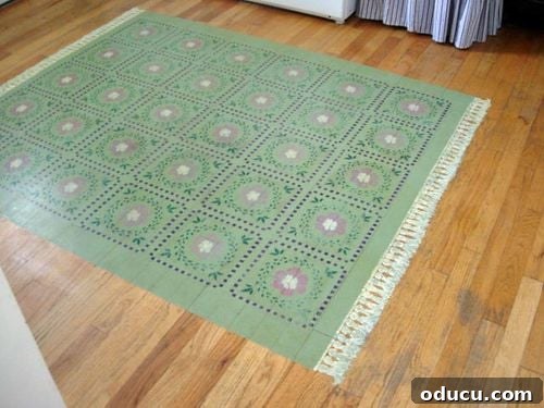 The Art of Stenciling a Rug onto Your Floor 3 Realistic painted rug on a floor, demonstrating a clever decor idea and artistic detail