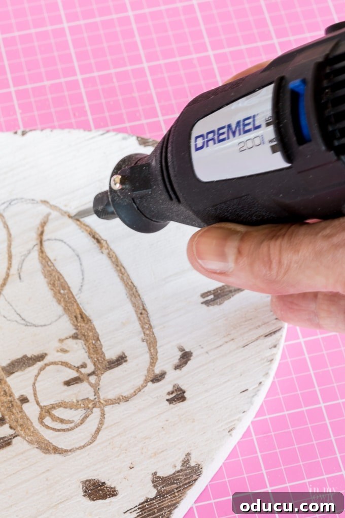 Artisan Rustic Monogram Wood Decor 16 monogram-wood-ornament-made-using-a-dremel-rotary-tool