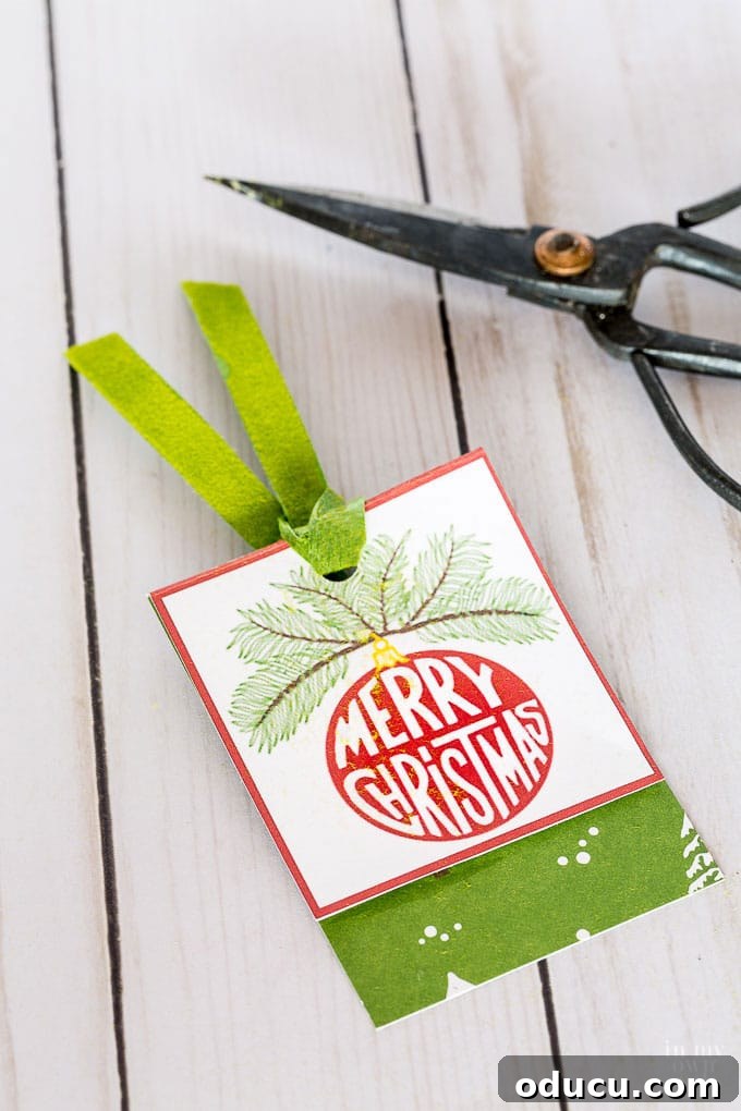 Christmas Free Printable Square Gift Tags Layered with Scrapbook Paper