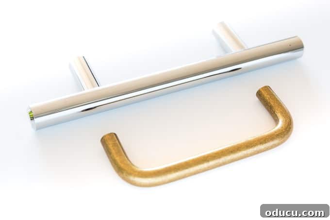 Comparison image of old versus new kitchen cabinet hardware, highlighting the style difference.