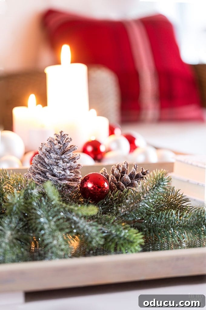 Timeless Christmas Decor with Red White and Greenery 17 Christmas Candle decorating ideas for tables
