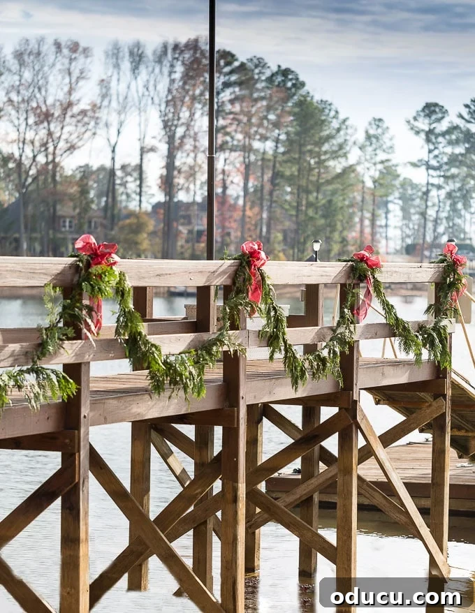 Timeless Christmas Decor with Red White and Greenery 19 Outdoor deck and dock Christmas decorating ideas