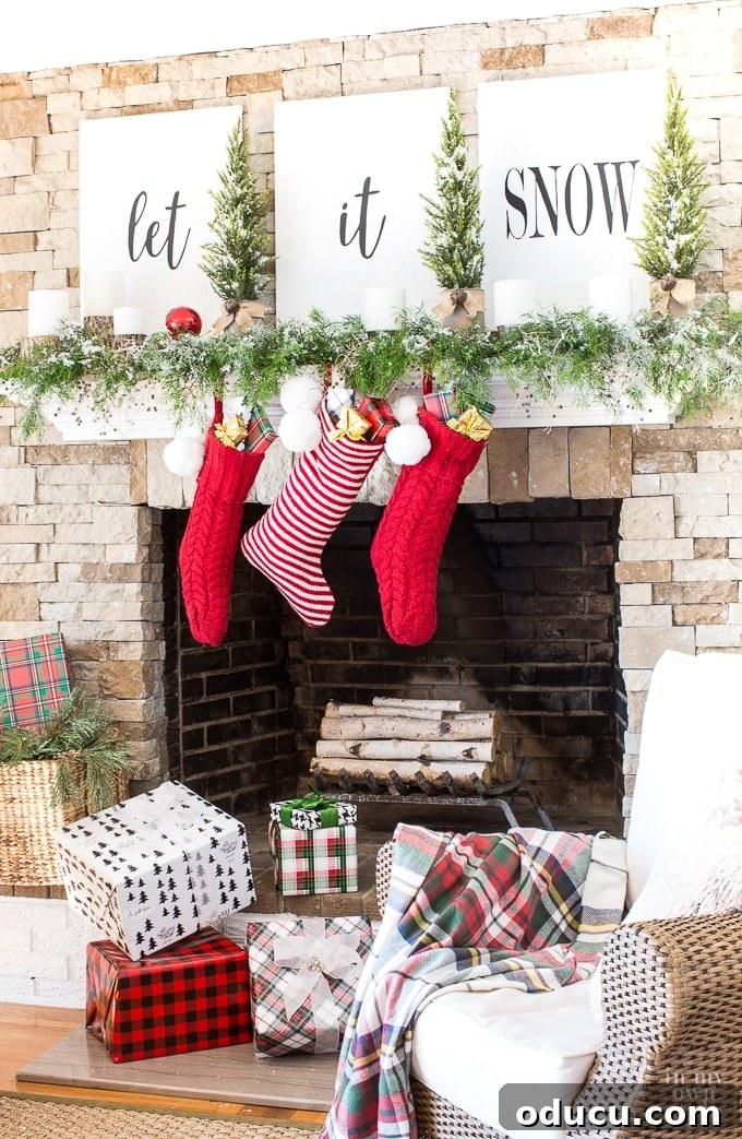 Timeless Christmas Decor with Red White and Greenery 5 Christmas mantel decorating idea