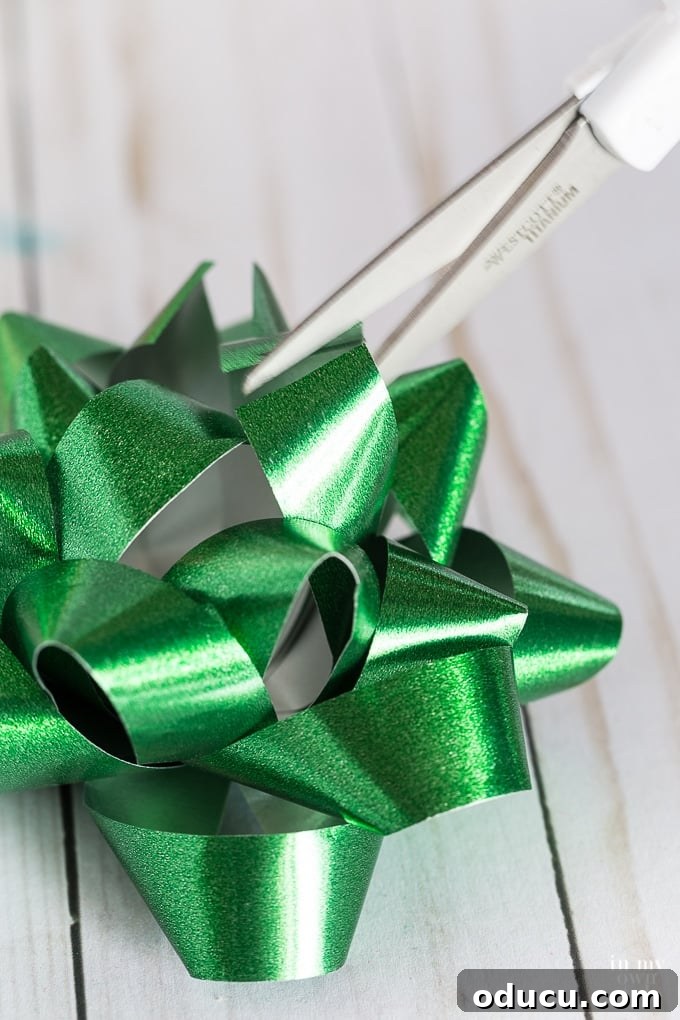 Standard gift bow tweak for creative Christmas wrapping demonstrating the cut