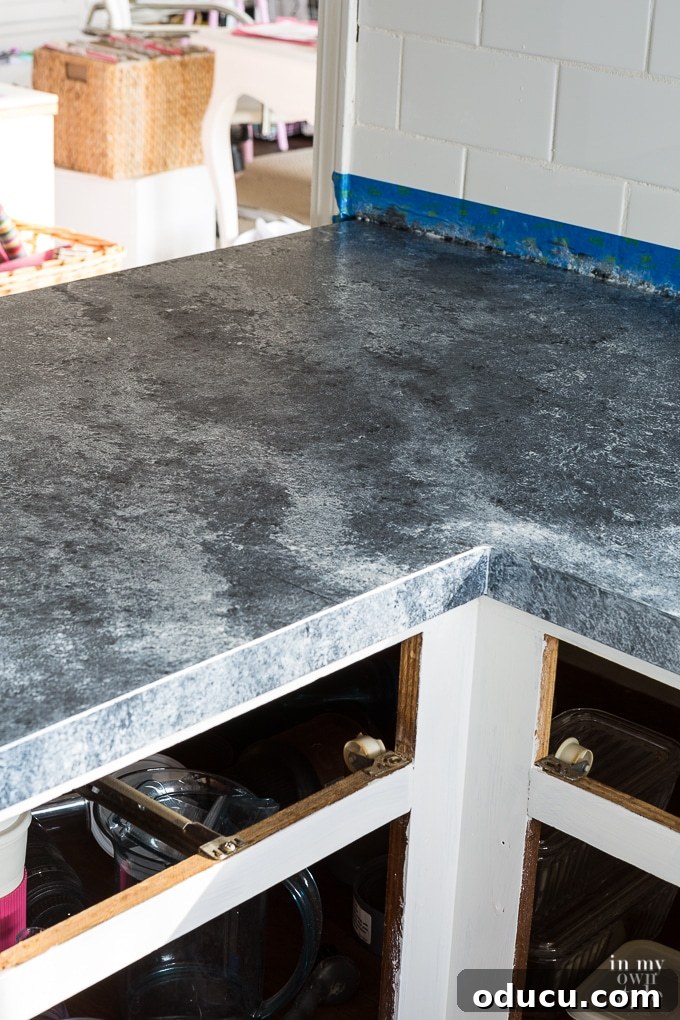 Kitchen Remodel: The Home Stretch 10 Close-up of Giani countertop paint application, showing subtle texture and layers for a natural look