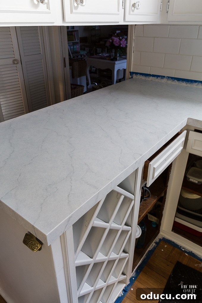 Kitchen Remodel: The Home Stretch 11 Multiple layers of Giani white limestone paint with hand-painted veining to create a marble effect