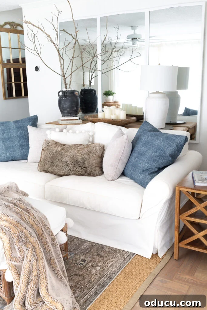Own Your January 2 blue and white living room decorated for winter.