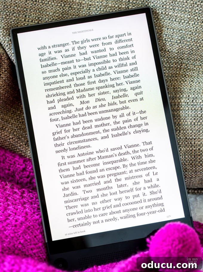 Own Your January 4 Person reading a novel on a tablet