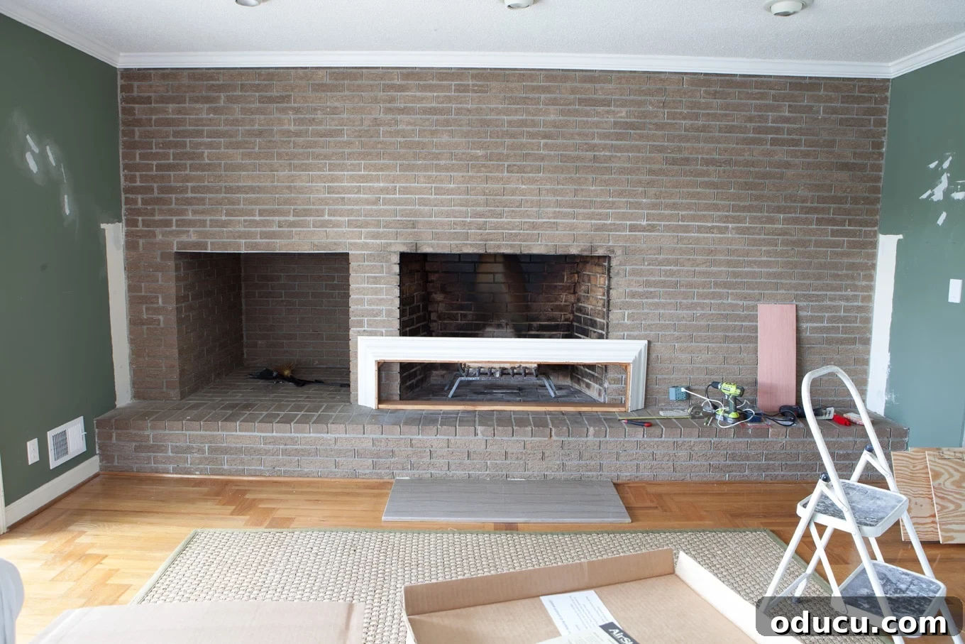 Lake House Living A DIY First Year 16 Guide on how to install plywood planking over an interior brick wall